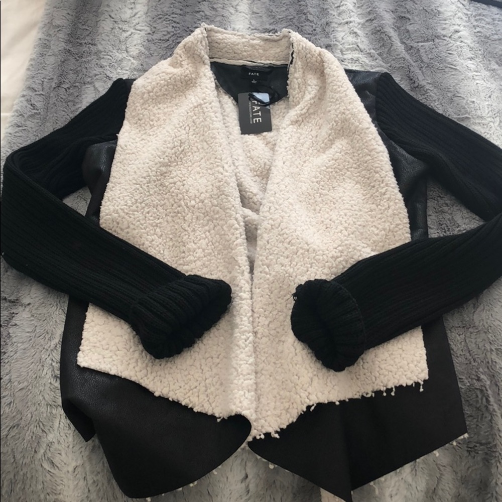 Faux leather jacket with Sherpa